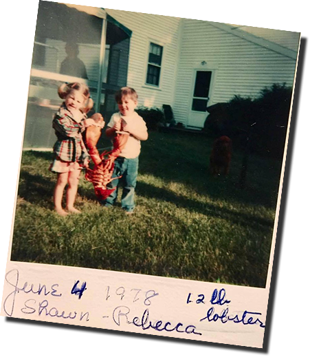 Shawn McEwen holding a twelve pound lobster in Alfred, Maine, June 1978